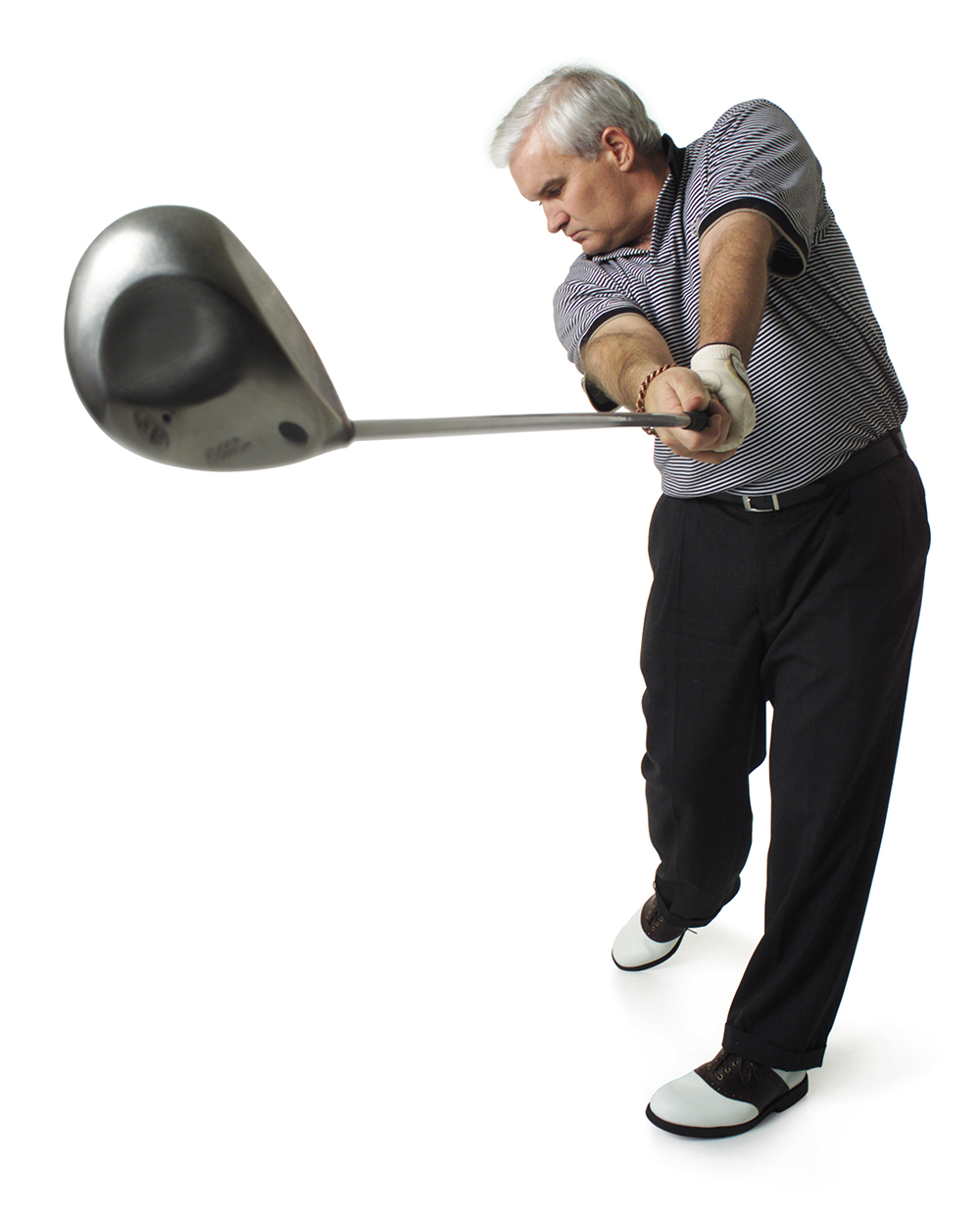 Couple reviewing retirement planning documents with a financial advisor at a desk